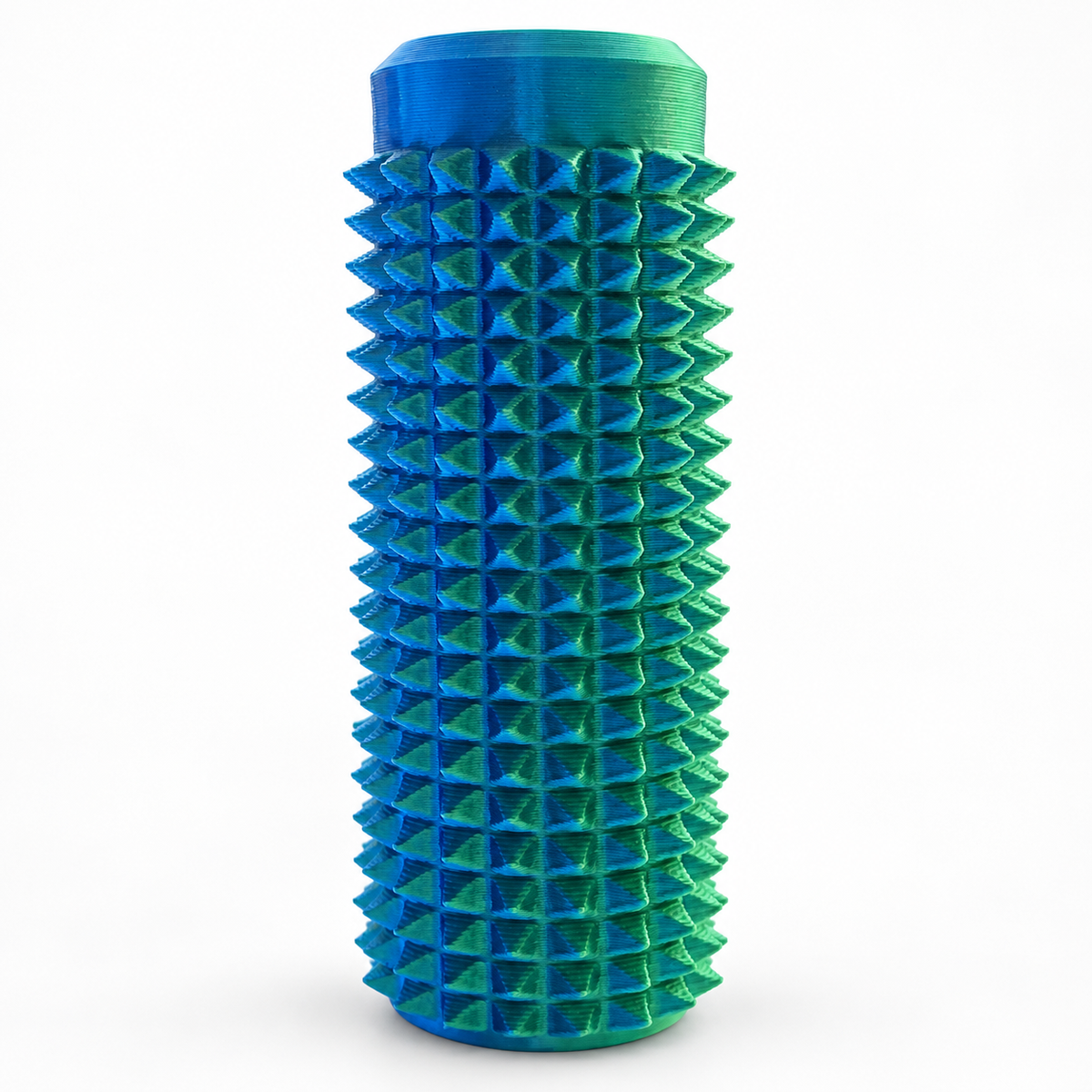 Blue and green Spike Roller Fidget on a plain white background